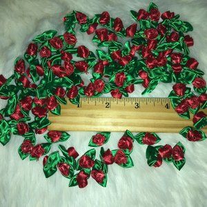 100 smaller red ribbon roses New